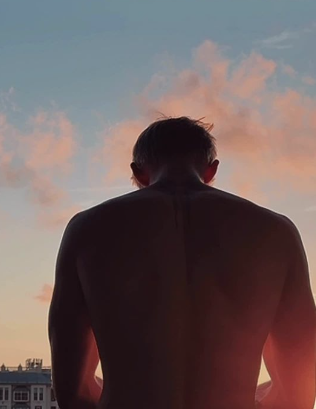 Parker silhouetted against the sunset